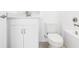 Clean bathroom with white vanity, toilet, and bathtub at 27472 Black Kite Ave, Howey In The Hills, FL 34737