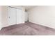 Bedroom with carpet, double door closet, and access to a bathroom at 3340 Bellissimo Ave, Kissimmee, FL 34746