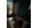 Bathroom with toilet, sink, and shower needs renovation at 3814 Ne 5Th St, Ocala, FL 34470