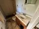 Bathroom with shower, toilet, and sink needs cleaning and repair at 3814 Ne 5Th St, Ocala, FL 34470