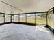 Spacious screened porch overlooks a large backyard at 5119 Timber Ridge Trl, Ocoee, FL 34761
