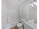 Clean bathroom with white tub and vanity at 5119 Timber Ridge Trl, Ocoee, FL 34761