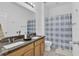 Clean bathroom with double vanity and a shower/tub combo at 5364 Ragusa Loop, Saint Cloud, FL 34771