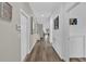 Bright hallway with wood-look floors at 5364 Ragusa Loop, Saint Cloud, FL 34771