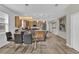 Open concept dining area with kitchen views at 5364 Ragusa Loop, Saint Cloud, FL 34771