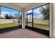 Screened porch with view of backyard and gazebo at 5364 Ragusa Loop, Saint Cloud, FL 34771