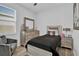 Cozy bedroom featuring a twin-size bed and a dresser at 5364 Ragusa Loop, Saint Cloud, FL 34771