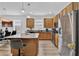 Modern kitchen with stainless steel appliances and granite countertops at 5364 Ragusa Loop, Saint Cloud, FL 34771