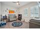 Bedroom with toddler bed, shelving unit, and playful decor at 8760 Shapley St, Orlando, FL 32827