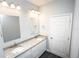 Updated bathroom with double vanity and granite countertops at 8969 Sheppard Dr, Lake Wales, FL 33898