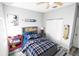 Charming bedroom with wood-look floors and double closets at 8969 Sheppard Dr, Lake Wales, FL 33898