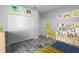 bedroom with built-in shelving and playful decor at 8969 Sheppard Dr, Lake Wales, FL 33898