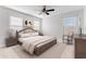 Spacious bedroom with king-size bed and large windows at 9849 Lost Creek Dr, Winter Garden, FL 34787