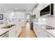 Modern kitchen with stainless steel appliances and an island at 9849 Lost Creek Dr, Winter Garden, FL 34787