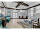 Community clubhouse lobby with seating and desks at 9849 Lost Creek Dr, Winter Garden, FL 34787