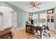 Home office with built-in shelving and a large workspace at 9849 Lost Creek Dr, Winter Garden, FL 34787