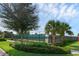 Community tennis courts with lush landscaping and fencing at 9849 Lost Creek Dr, Winter Garden, FL 34787