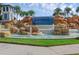 Waterleigh community entrance with a waterfall feature at 9849 Lost Creek Dr, Winter Garden, FL 34787