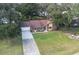 House with driveway and yard, aerial view at 10150 Sw 73Rd Ter, Ocala, FL 34476