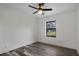 Spacious bedroom with wood-look floors and ceiling fan at 10150 Sw 73Rd Ter, Ocala, FL 34476