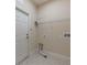 Laundry room with built-in shelving and exterior access at 142 Heatherbrooke Cir, Oviedo, FL 32765