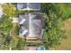 Bird's eye view of the house and surrounding patio area at 1725 Singing Palm Dr, Apopka, FL 32712