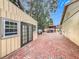 Brick paved backyard with shed and pergola at 1725 Singing Palm Dr, Apopka, FL 32712