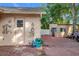 Small backyard shed with brick patio in front at 1725 Singing Palm Dr, Apopka, FL 32712