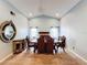 Formal dining room with large table and chandelier at 1725 Singing Palm Dr, Apopka, FL 32712