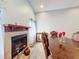 Formal dining area with fireplace and decorative accents at 1725 Singing Palm Dr, Apopka, FL 32712