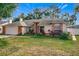 Charming brick and siding home with two-car garage at 1725 Singing Palm Dr, Apopka, FL 32712