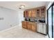 Kitchen features granite countertops, wood cabinets, and stainless steel appliances at 1725 Singing Palm Dr, Apopka, FL 32712