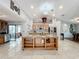 Spacious kitchen with an island and granite countertops at 1725 Singing Palm Dr, Apopka, FL 32712