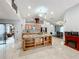 Open kitchen with island and granite countertops at 1725 Singing Palm Dr, Apopka, FL 32712