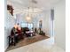 Spacious living room with hardwood floors and elegant furniture at 1725 Singing Palm Dr, Apopka, FL 32712