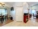 Open living space with hardwood floors and fireplace at 1725 Singing Palm Dr, Apopka, FL 32712