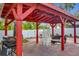 Relaxing patio area with covered pergola at 1725 Singing Palm Dr, Apopka, FL 32712