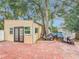 Detached workshop with brick patio and double doors at 1725 Singing Palm Dr, Apopka, FL 32712