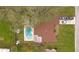 Aerial view showing home, pool, and yard at 2510 W Doris St, Kissimmee, FL 34741