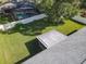 Aerial view showcasing backyard, pool, and house at 2613 Tamarind Dr, Edgewater, FL 32141