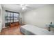 Small bedroom with hardwood floors and a twin bed at 3250 Mountain Lake Cutoff Rd, Lake Wales, FL 33859