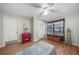 Bright bedroom with wood floors and ample closet space at 3250 Mountain Lake Cutoff Rd, Lake Wales, FL 33859