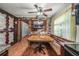 Brick accent wall in dining area with built-in bench seating at 3250 Mountain Lake Cutoff Rd, Lake Wales, FL 33859