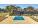 Outdoor basketball court with clear markings and surrounding landscape at 349 Alcove Dr, Groveland, FL 34736