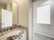 Clean bathroom with granite countertop and sink at 349 Alcove Dr, Groveland, FL 34736