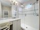 Elegant bathroom with double vanity, quartz countertop and large shower at 349 Alcove Dr, Groveland, FL 34736