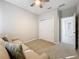 Spacious bedroom with a sofa and large closet at 349 Alcove Dr, Groveland, FL 34736