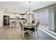 Open concept dining area with kitchen view at 349 Alcove Dr, Groveland, FL 34736