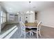 Bright dining area with round table and four chairs at 349 Alcove Dr, Groveland, FL 34736