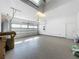 Large garage with epoxy floor and high ceiling at 349 Alcove Dr, Groveland, FL 34736